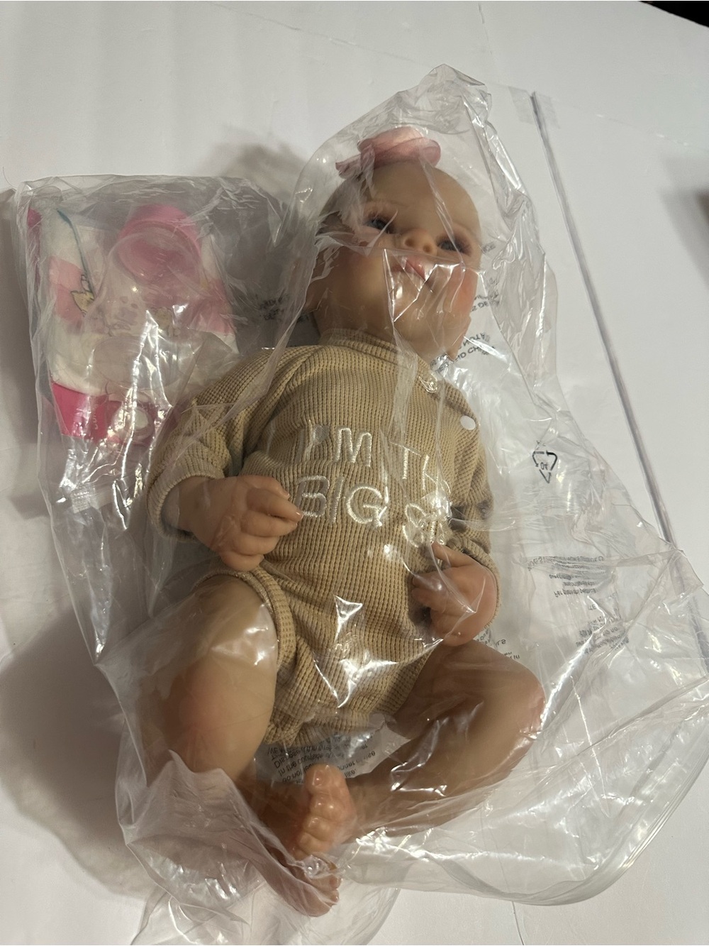 Reborn Baby Doll in Beige Romper with Pink Headband - Kids Toys